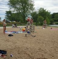 People lounging at beach on the sand